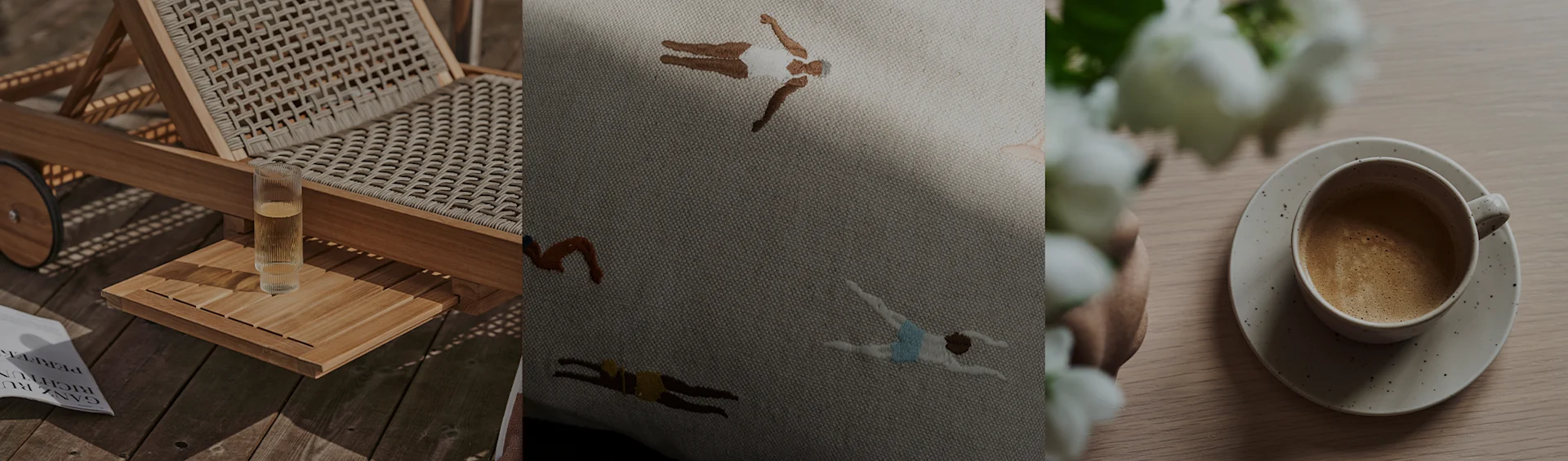 一个带饮料的躺椅、一个绣有游泳者的靠垫和一杯咖啡及白色花朵。